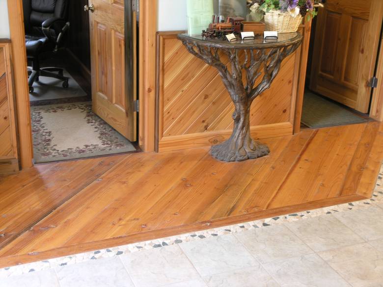 TWII Circle-Sawn Flooring and Wainscot / The flooring of Trestlewood's Blackfoot office entryway is TWII C-S